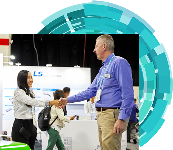Attendee and exhibitor shaking hands at a tradeshow